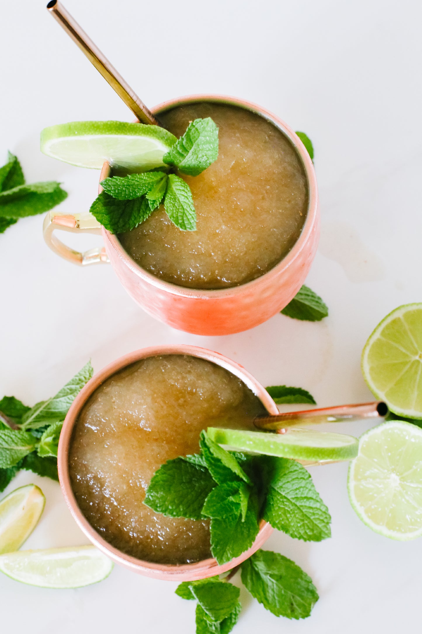 Lush Moscow Mule Slushie, a refreshing frozen drink with zesty lime and ginger flavors.