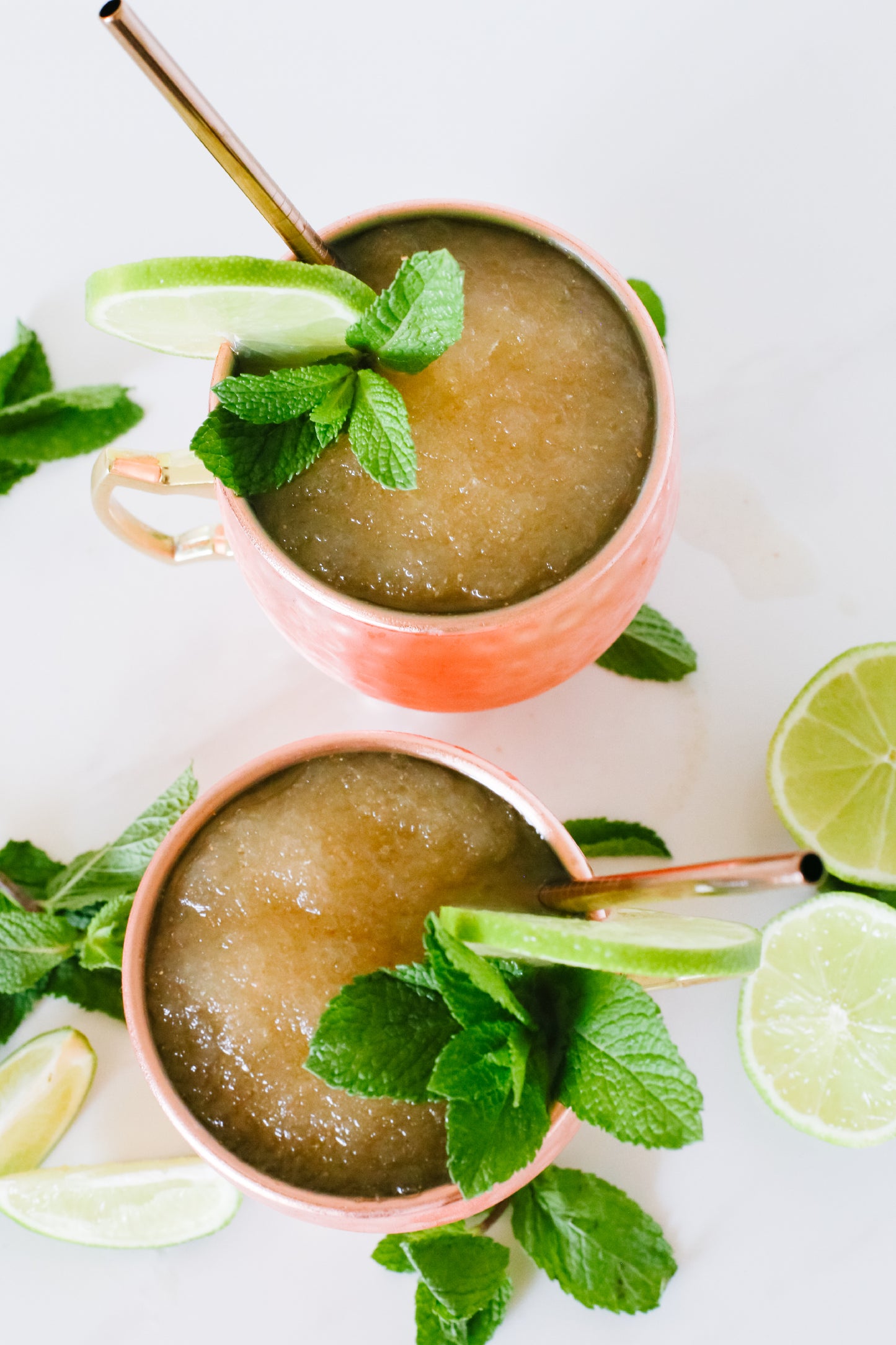 Lush Moscow Mule Slushie, a refreshing frozen drink with zesty lime and ginger flavors.






